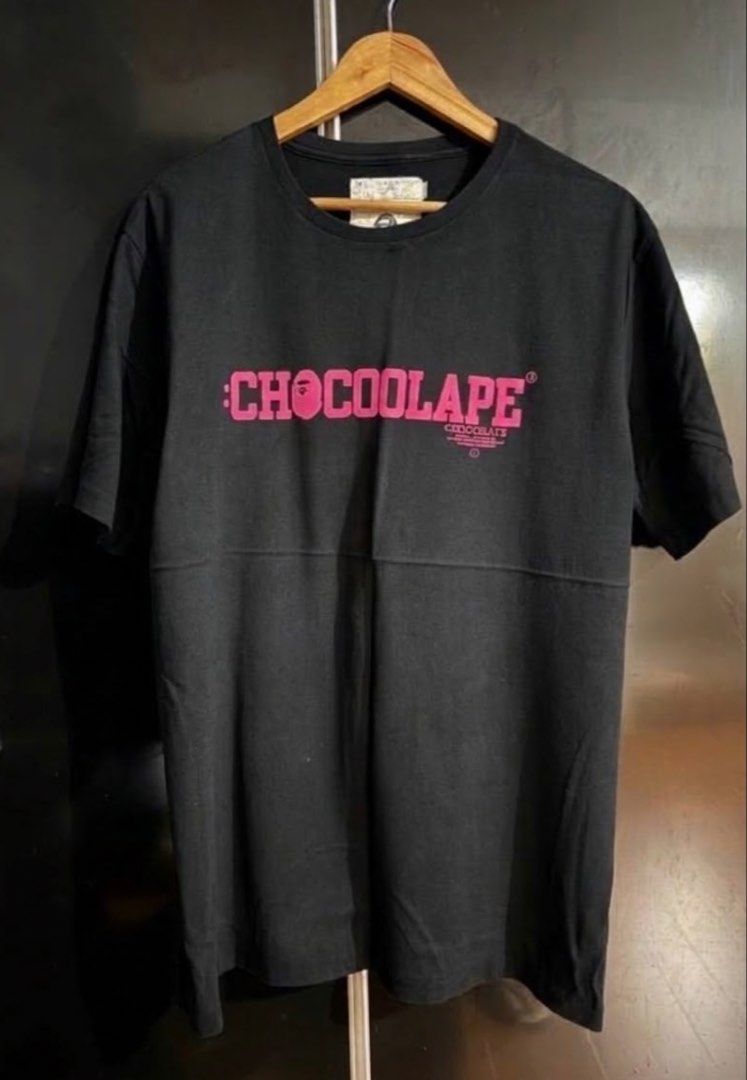 CHOCOOLATE Bathing Ape (BAPE) (Category: Tshirts & Polo Shirts ) located in Quezon City. Submitted by raphjohn (Listing ID 1471188884, Image 1). Description: - Brand::CHOCOOLATE x BAPE collab - XL on tag - Color: Black with pink SUEDE script/logo - Excellent Condition - Color rate 9.8/10 black na black in person -Location QC.