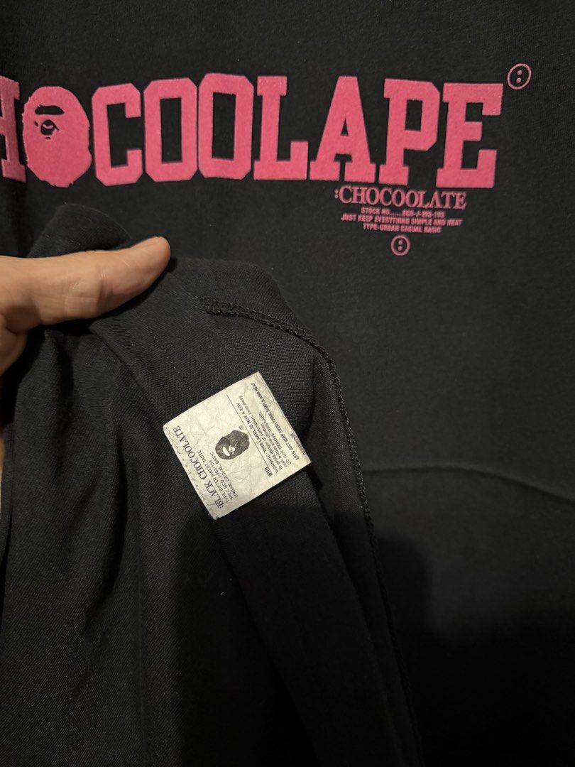 CHOCOOLATE Bathing Ape (BAPE) (Category: Tshirts & Polo Shirts ) located in Quezon City. Submitted by raphjohn (Listing ID 1471188884, Image 3). Description: - Brand::CHOCOOLATE x BAPE collab - XL on tag - Color: Black with pink SUEDE script/logo - Excellent Condition - Color rate 9.8/10 black na black in person -Location QC.