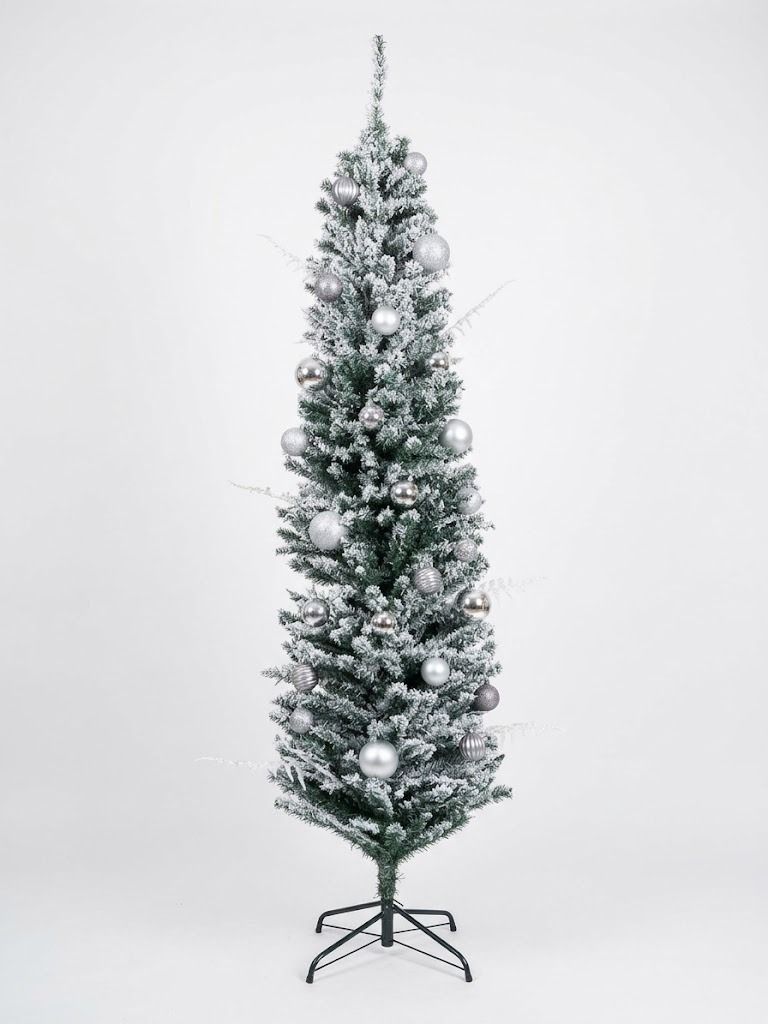 Christmas Tree 7ft - Slim Type with balls and ornaments (Category: Artificial Plants & Flowers) located in Pasig City. Submitted by mon.sib (Listing ID 1471208933, Image 2). Description: - Got the tree last year for 1800, the ornaments for 1200 - Slim snow-flocked Christmas tree designed for small spaces - Includes a set of silver and white bauble ornaments - Features a sturdy black metal stand - Quick and hassle-free setup - actual photos posted