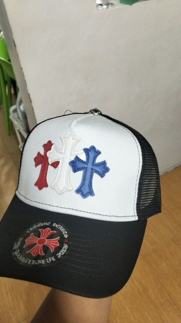 Chrome Hearts Multi Cross Trucker Hat Black White (Category: Caps & Hats) located in Manila. Submitted by tripthriftbybogz (Listing ID 1471262915, Image 1). Description: - Brand: Chrome Hearts - Style: Trucker Hat / Snapback - Colorway: Classic Black and White with breathable mesh back - Detailing: Rare red, white, and blue leather cross patches on the front panel - Brim: Curved black brim complete with the iconic cross graphic sticker - Closure: