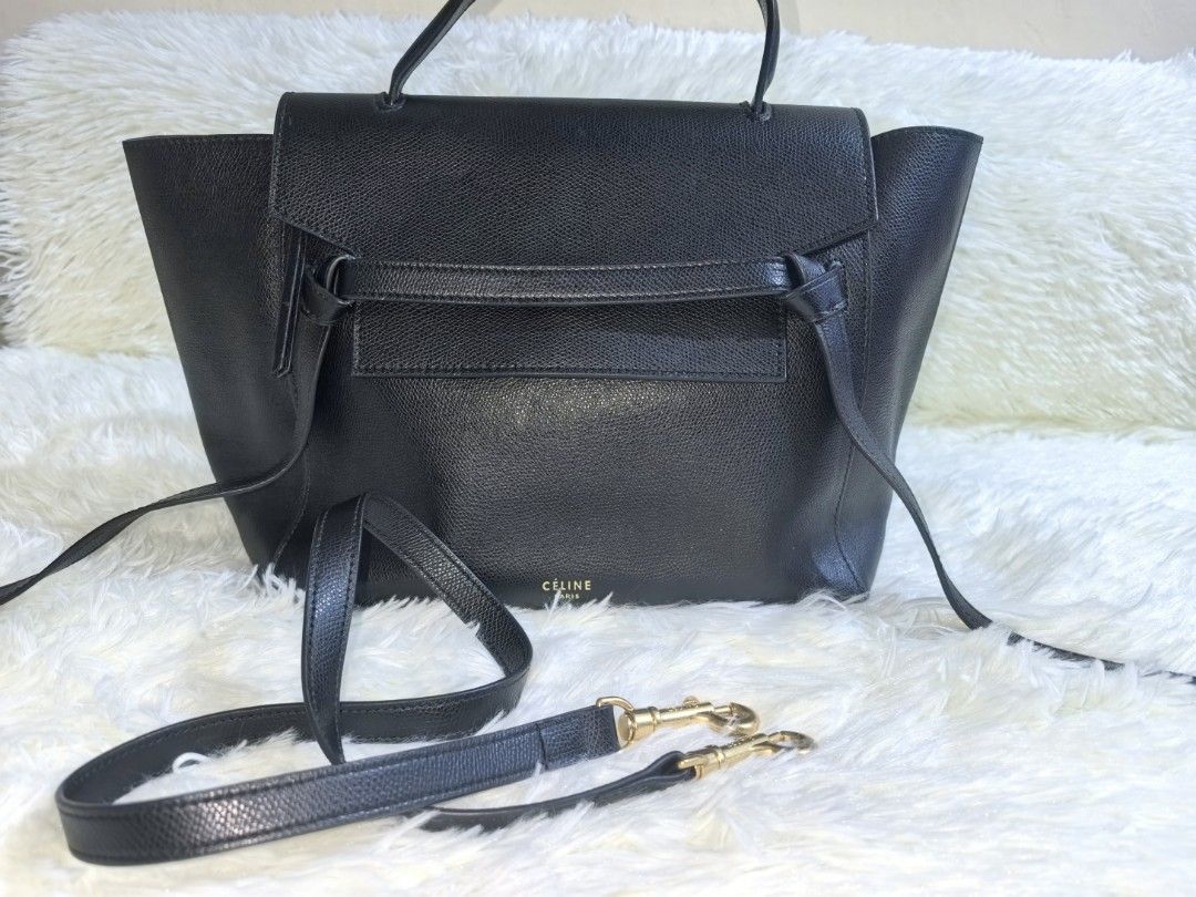 CÉLINE Belt Bag – Black (Category: Luxury Bags & Wallets) located in Tacloban City. Submitted by curatedbygenz (Listing ID 1471293318, Image 1). Description: ✨ Features: Classic Belt Bag silhouette Structured body with winged sides Front belt detail Top handle Detachable shoulder strap Gold-tone hardware Black textured leather A beautiful everyday bag with a sophisticated, minimalist look..