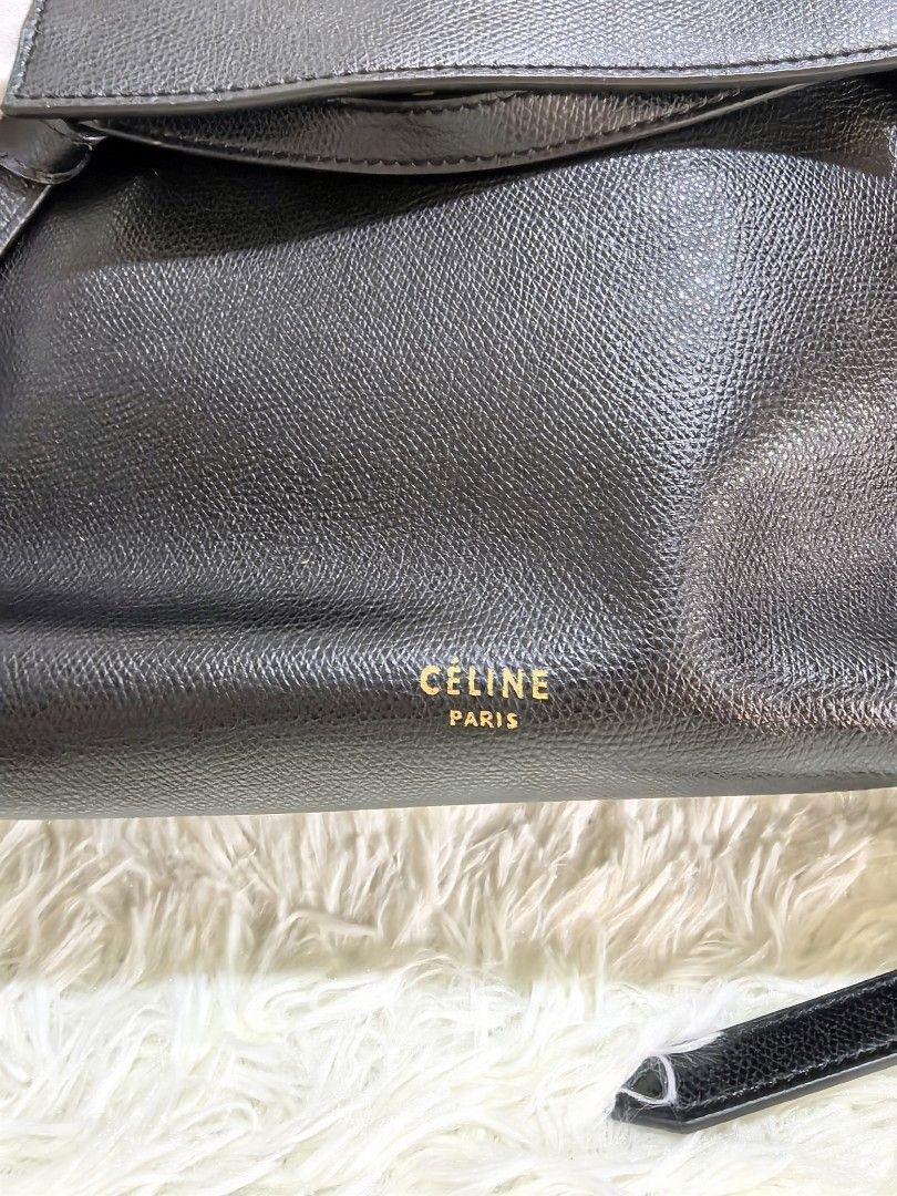 CÉLINE Belt Bag – Black (Category: Luxury Bags & Wallets) located in Tacloban City. Submitted by curatedbygenz (Listing ID 1471293318, Image 3). Description: ✨ Features: Classic Belt Bag silhouette Structured body with winged sides Front belt detail Top handle Detachable shoulder strap Gold-tone hardware Black textured leather A beautiful everyday bag with a sophisticated, minimalist look..