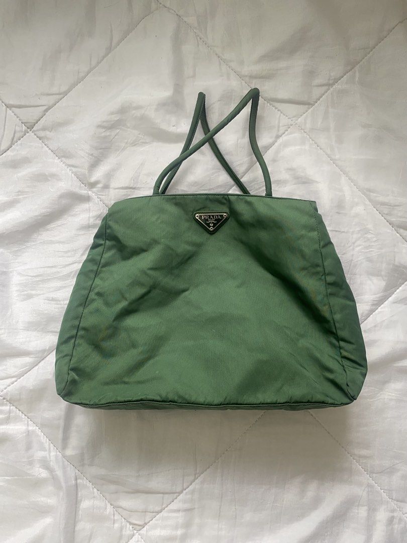 Preloved bags (Category: Tote Bags) located in Tarlac. Submitted by angell_closet (Listing ID 1471133518, Image 2). Description: Price list: 1. Coach - 500 2. Prada - 500 3. Guess - 300 4. MK - 300 5. Brown leather - 200 6. LV - 200 7. Silver tote - 200 8. Gray tote - 200 9. CD - 150 10. Crocodile bag - 200 (brand new) Can send more pictures/details if surr buyer. Shipping thru j&t .