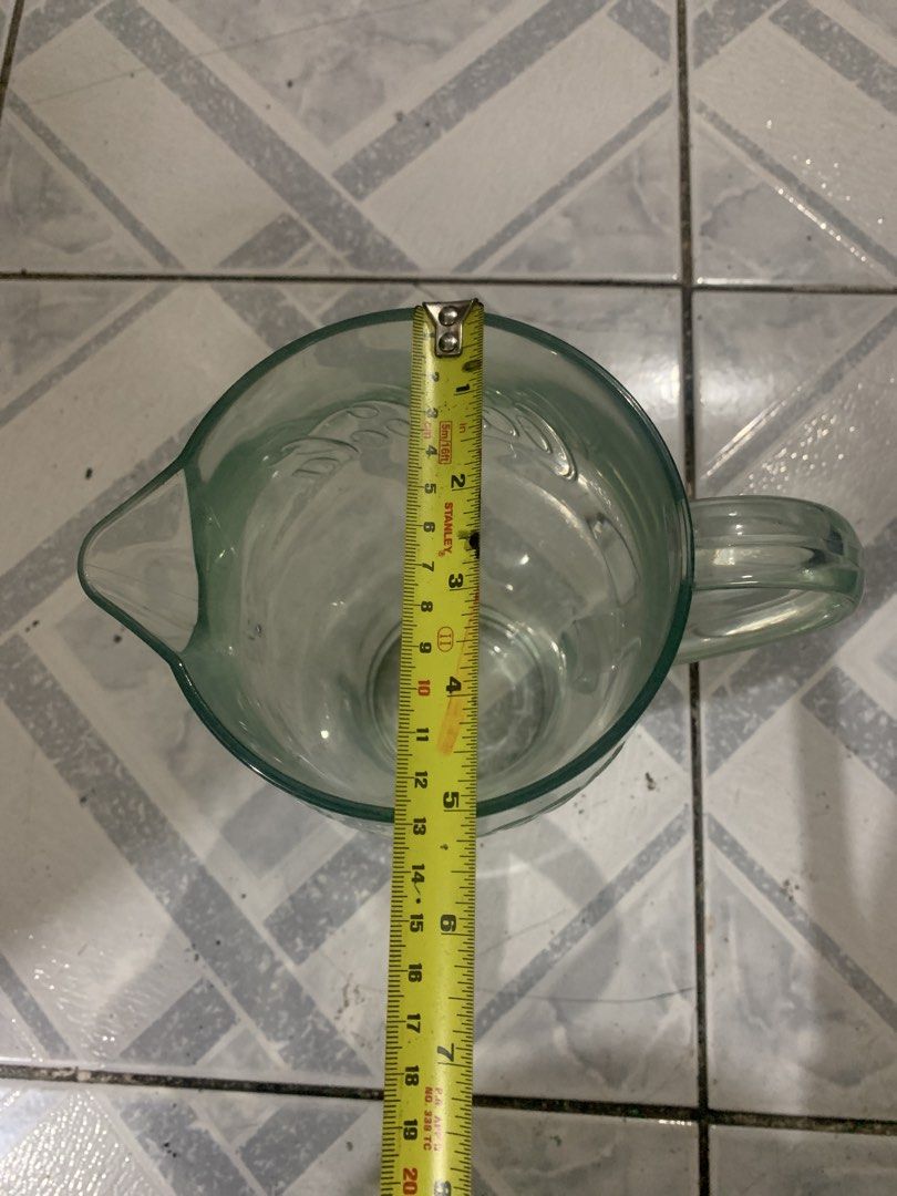 Coca-Cola Glass Pitcher Jug (Category: Pitchers & Dispensers) located in Antipolo. Submitted by cebb888 (Listing ID 1471153320, Image 2). Description: - Authentic Coca-Cola clear glass pitcher - Features classic embossed logo details - Sturdy side handle and convenient pouring spout - Compact size: stands about 7 inches tall - Heavy and durable glass construction - Clean interior, sparkling, and ready to use - Perfect for daily use or serving gue