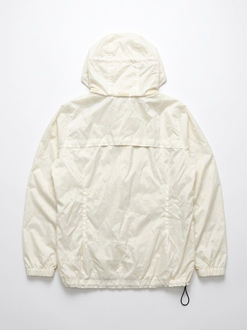 Columbia White Windbreaker Hooded Jacket (Category: Coats, Jackets and Outerwear) located in Manila. Submitted by antoncorr98797 (Listing ID 1471290281, Image 2). Description: Columbia Lightweight Windbreaker Jacket Condition: Excellent pre-owned condition Color: Off-white / Cream Size: Large (L) Features: Full-zip front, adjustable hood and hem drawstrings, and signature Columbia chest logo. Measurements (taken flat): Chest (Pit to Pit): 50 cm L