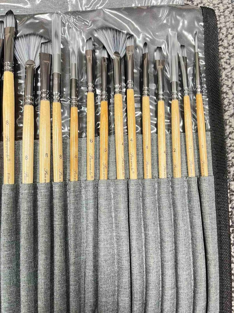 Comprehensive Artist Paintbrush Set with Roll-up Case (Category: Craft Supplies & Tools) located in Caloocan City. Submitted by eunicekim7 (Listing ID 1471134184, Image 3). Description: - Condition: 100% Brand New / Unused - Variety: Includes flat brushes, detail brushes, fan brushes, and a palette knife - Material: Classic wooden handles with durable bristles - Storage: Comes in a sleek gray fabric roll-up case with protective plastic sleeves - 