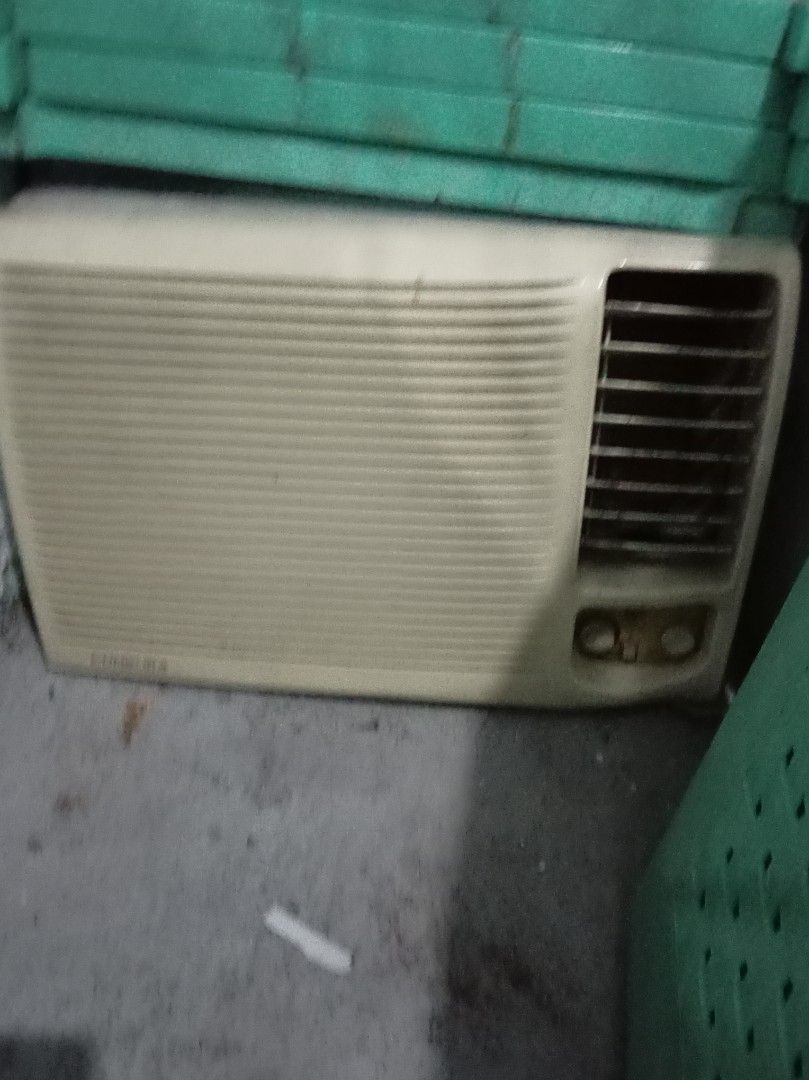 Condura Window Type Air Conditioner (Category: Air Conditioning and Heating) located in Caloocan City. Submitted by maynaito (Listing ID 1471130626, Image 1). Description: - Brand/Model: Condura Window Type Air Conditioner - Color: Off-White finish with louvered front intake - Controls: Standard manual knobs for temperature and fan speed - Condition: Powers on and cools normally, with minor dust and cosmetic wear from garage storage - Fit: Standa