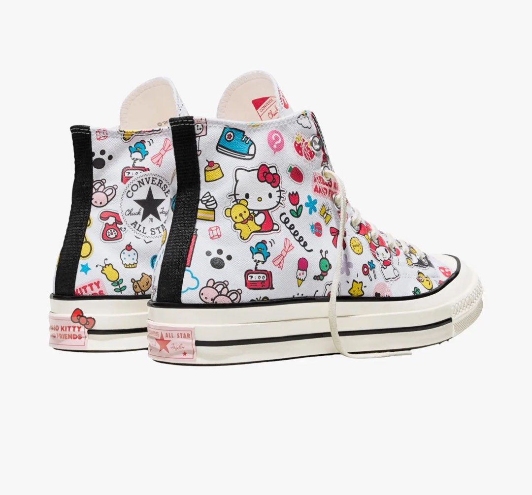 Converse x HELLO KITTY Chuck 70 | Limited Edition (Category: Sneakers) located in Marikina City. Submitted by teffiiee (Listing ID 1471207066, Image 1). Description: - Lightly use WITH BOX - Authentic Converse Chuck 70 high-top sneakers - White canvas upper covered in colorful Sanrio characters ( Kitty, Tuxedosam, Badtz-Maru) - Classic rubber toe cap and stylish black midsole piping - Cute pink heel patch with Kitty branding - Includes standard w
