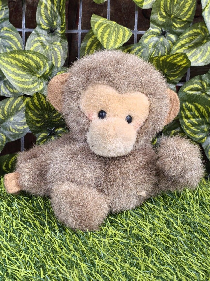 Cute fluffy brown monkey plush toy soft doll (Category: Plushies & Soft Toys) located in Paranaque City. Submitted by furugiyafinds (Listing ID 1471182895, Image 1). Description: - Super soft and fluffy brown fur with a lighter brown face and inner ears - Features adorable round black button eyes and a cute sitting pose with one paw raised - Clean and well-kept condition - Perfect cuddly buddy for kids or plush toy collectors - Small tag attached