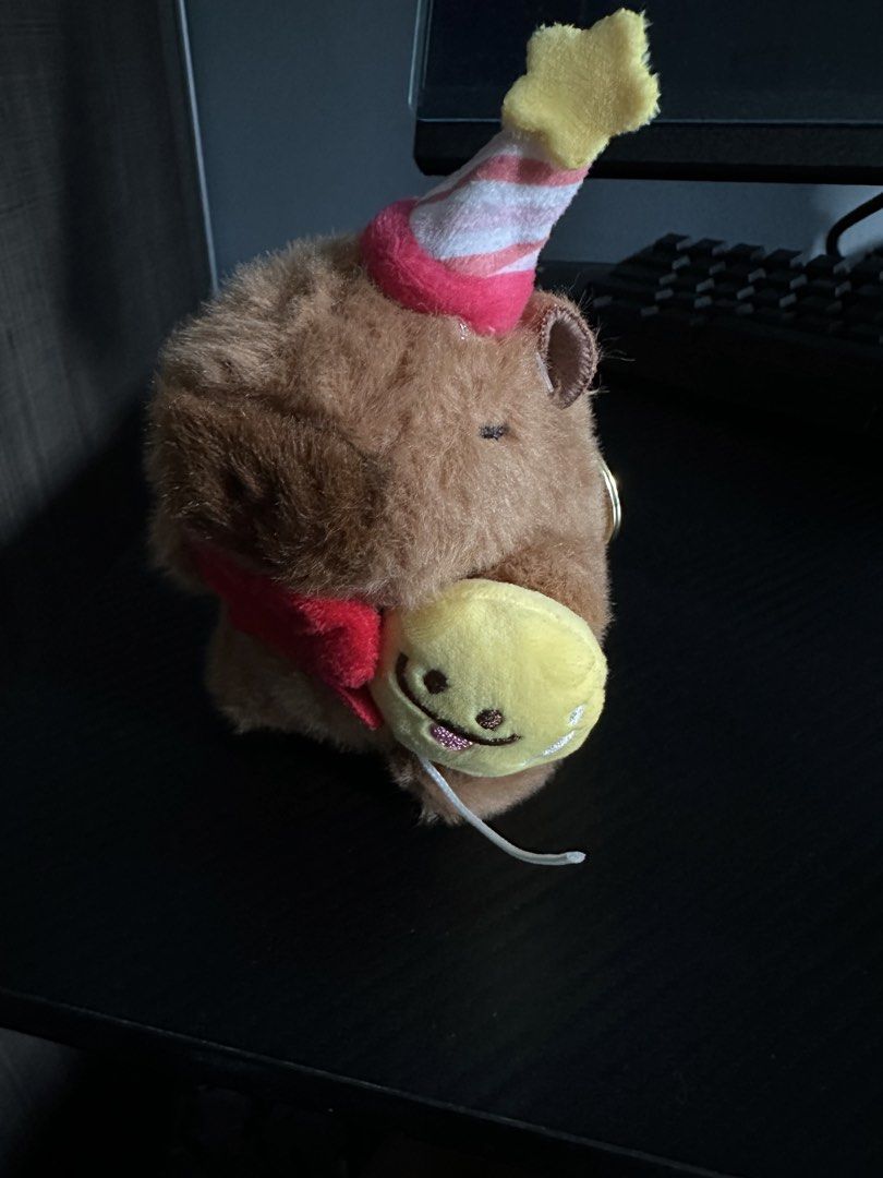Cute keychains (Category: Plushies & Soft Toys) located in Singapore. Submitted by mr_sprinkles027p (Listing ID 1471156445, Image 7). Description: Durian - $5 Pink - $5 Capybara ( party hat ) - $6 Capybara ( bride ) - $6 All for $20.