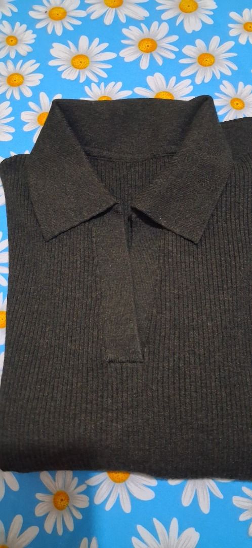 Dark Green Ribbed Collar Long Sleeve Sweater (Category: Longsleeves) located in Manila. Submitted by katkween23 (Listing ID 1471215647, Image 1). Description: - Color: Dark green - Style: Long sleeve sweater with collar and V-neck placket - Material: Soft ribbed knit fabric - Fit: Comfortable and cozy for cooler weather - Versatility: Easy to style with jeans or skirts.