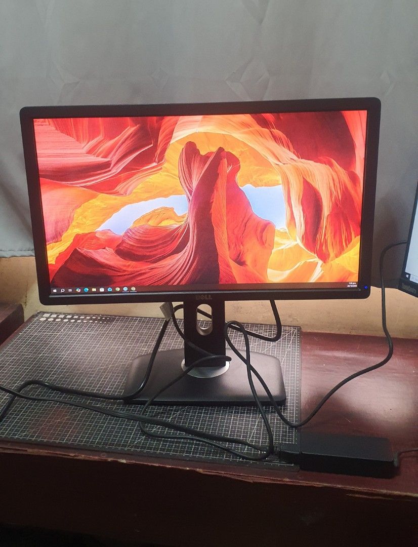 Dell Computer Monitor P2312Ht (Category: Monitor Screens) located in Manila. Submitted by easy_a (Listing ID 1471166249, Image 2). Description: - Brand: Dell Desktop Monitor - Condition: Tested and working 100% - Display: Clean screen, zero dead pixels, crisp quality - Ports: Standard ports located at the back - Inclusions: Black stand and power adapter - Status: Plug-and-play ready for your setup.