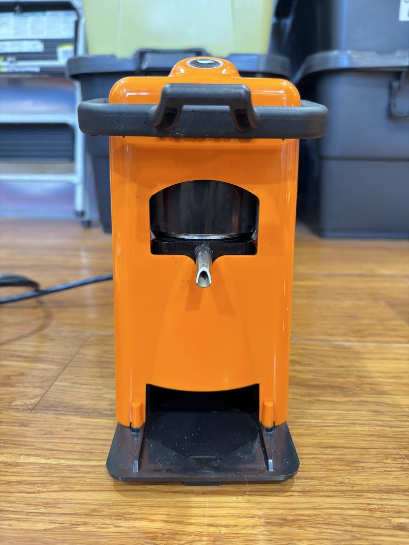 Didiesse Coffee Pod Machine (Category: Coffee Machines & Makers) located in Manila. Submitted by kelvs1435 (Listing ID 1471189213, Image 3). Description: - Model: Didiesse Frog Revolution Coffee Pod Machine - Color: Vibrant orange with stylish black housing - Compatibility: Standard 38 mm or 44 mm coffee pods (450W power) - Inclusions: Detachable water tank, drip tray grill, internal parts, and original box - Condition: Well-maintained, complete 