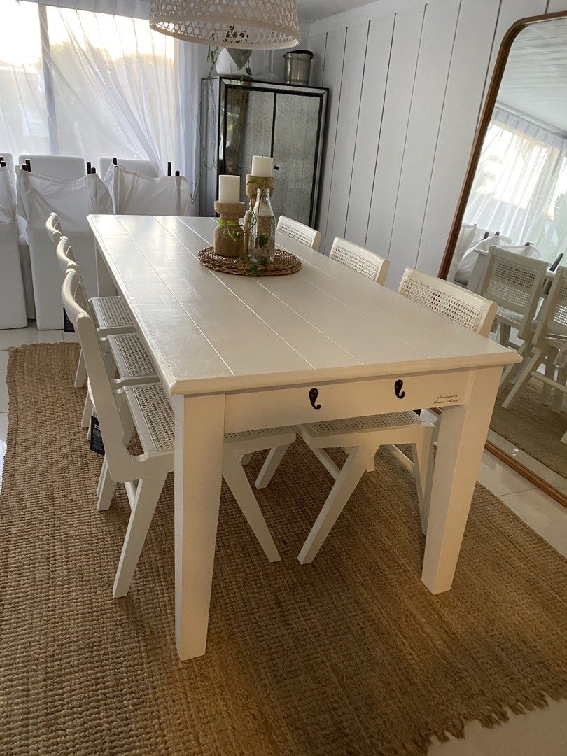 Dining Table (Category: Tables & Sets) located in Singapore. Submitted by dtcarie27 (Listing ID 1471149060, Image 1). Description: Rivièra Maison Dining Table – Hamptons / Coastal Style Price: S$350 Authentic Rivièra Maison large dining table, handmade and beautifully constructed. Classic Hamptons / coastal-country design featuring a warm grey timber top, white painted timber base and integrated storage drawer. A substantial, high-quality piece t