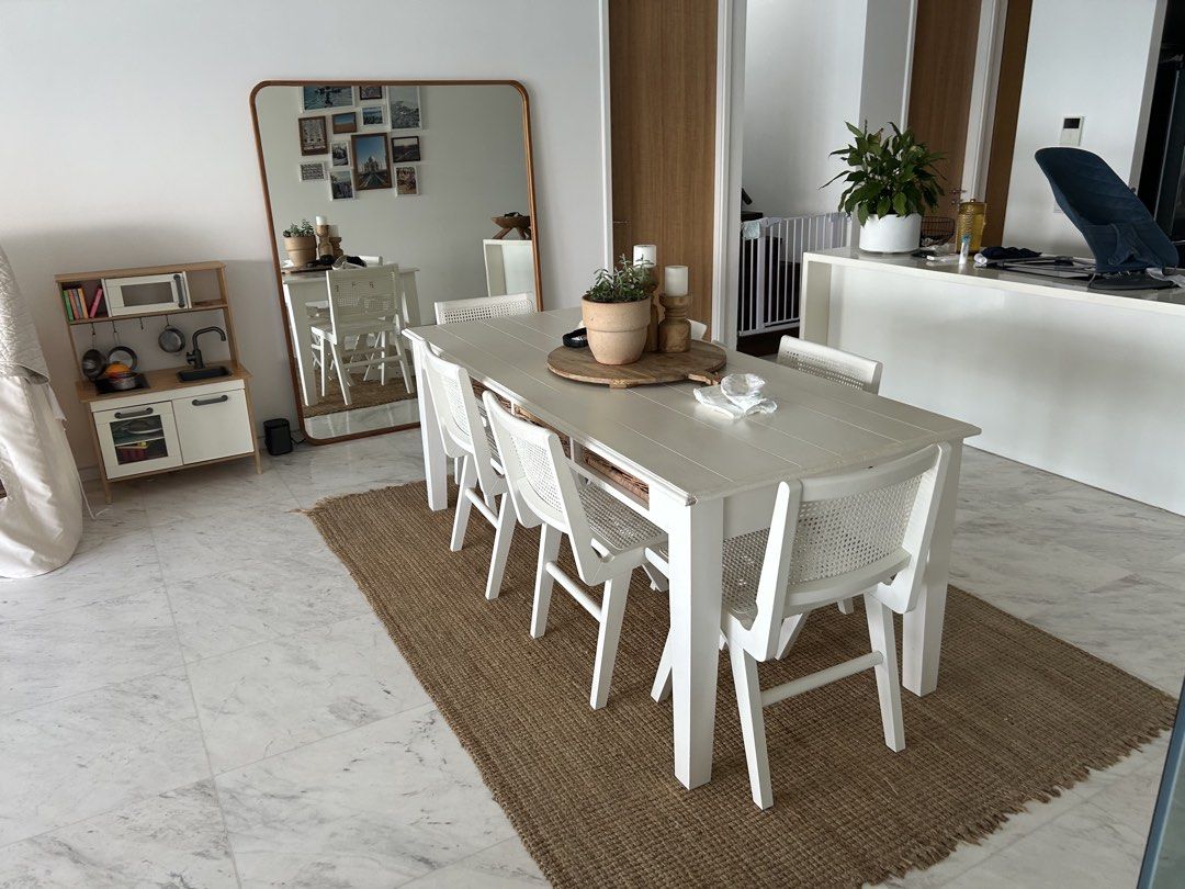 Dining Table (Category: Tables & Sets) located in Singapore. Submitted by dtcarie27 (Listing ID 1471149060, Image 2). Description: Rivièra Maison Dining Table – Hamptons / Coastal Style Price: S$350 Authentic Rivièra Maison large dining table, handmade and beautifully constructed. Classic Hamptons / coastal-country design featuring a warm grey timber top, white painted timber base and integrated storage drawer. A substantial, high-quality piece t