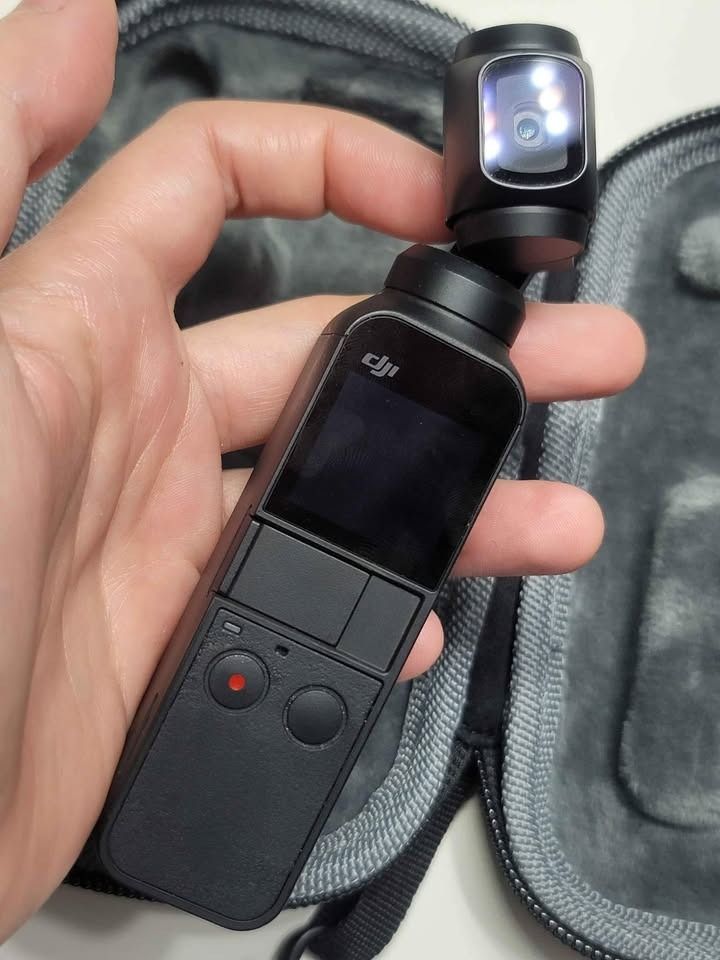 DJI Osmo Pocket 1 Gimbal Camera OT110 (Category: Gimbals & Stabilizers ) located in Taguig. Submitted by jun.p.mayer (Listing ID 1471241383, Image 3). Description: Selling my DJI Osmo Pocket 1 since hindi na rin masyadong nagagamit lately. Been clearing out some gadgets, and figured someone else might get more use out of this one. The unit is in good used condition and comes with its protective case. Compact and easy to carry, with built in stabi
