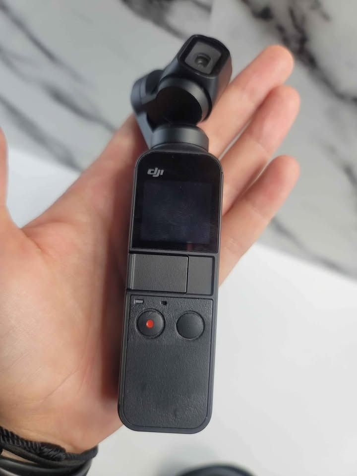 DJI Osmo Pocket 1 Gimbal Camera OT110 (Category: Gimbals & Stabilizers ) located in Taguig. Submitted by jun.p.mayer (Listing ID 1471241383, Image 2). Description: Selling my DJI Osmo Pocket 1 since hindi na rin masyadong nagagamit lately. Been clearing out some gadgets, and figured someone else might get more use out of this one. The unit is in good used condition and comes with its protective case. Compact and easy to carry, with built in stabi