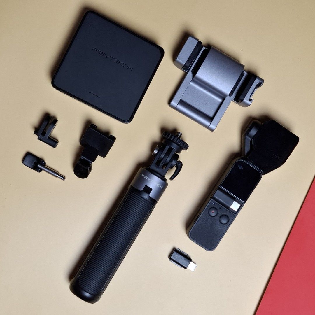 DJI Osmo Pocket 1 (Vlog Set Bundle) (Category: Video Cameras) located in Baguio. Submitted by kathuu27 (Listing ID 1471225596, Image 1). Description: 📌 FOR SALE: DJI Osmo Pocket 1 (Vlog Set Bundle) • DJI Osmo Pocket 1 Gimbal Camera • PGYTECH Extension Pole / Tripod • PGYTECH Phone Holder Plus (Smartphone Mount) • PGYTECH Filter Combo 4-pack PRO (ND Filters) • PGYTECH Gimbal Protector / Cover • 2x Smartphone Adapter (TYPE-C & IOS) KEY CAMERA FEAT