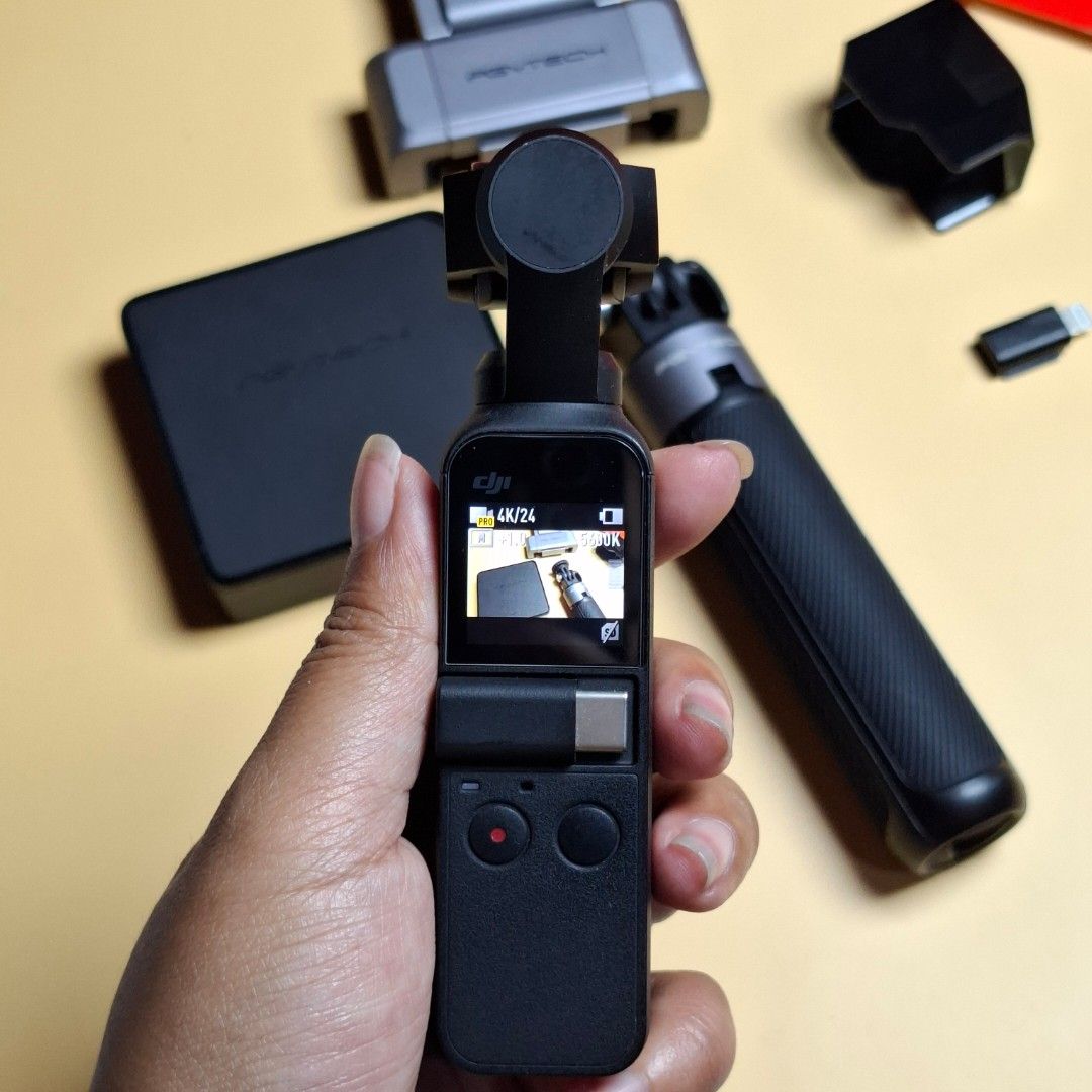 DJI Osmo Pocket 1 (Vlog Set Bundle) (Category: Video Cameras) located in Baguio. Submitted by kathuu27 (Listing ID 1471225596, Image 3). Description: 📌 FOR SALE: DJI Osmo Pocket 1 (Vlog Set Bundle) • DJI Osmo Pocket 1 Gimbal Camera • PGYTECH Extension Pole / Tripod • PGYTECH Phone Holder Plus (Smartphone Mount) • PGYTECH Filter Combo 4-pack PRO (ND Filters) • PGYTECH Gimbal Protector / Cover • 2x Smartphone Adapter (TYPE-C & IOS) KEY CAMERA FEAT