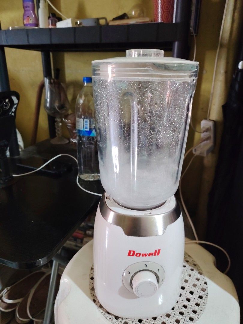 Dowell Blender White (Category: Juicers, Blenders & Grinders) located in Manila. Submitted by vastearth_3748fa (Listing ID 1471164817, Image 2). Description: - Brand: Dowell - Color: White - Condition: Clean, working well, and ready for kitchen use - Features: Clear pitcher with lid, rotary dial with speed settings, and pulse function - Best for: Making shakes, smoothies, and pureeing ingredients - Includes: Standard plug-in power cord.