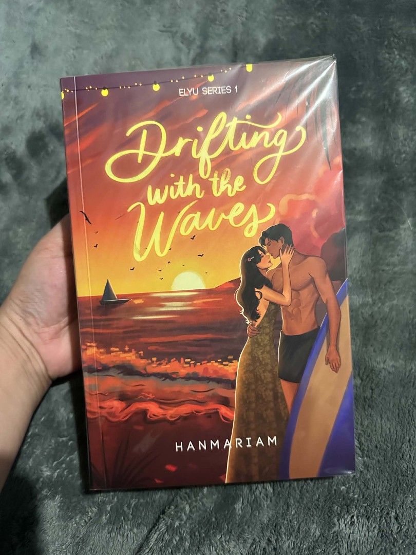 Drifting with the Waves by Hanmariam (Elyu Series 1) (Category: Storybooks) located in Naga. Submitted by fluttershaiii (Listing ID 1471254891, Image 1). Description: - very very good condition - brand new resealed - signed by the author.