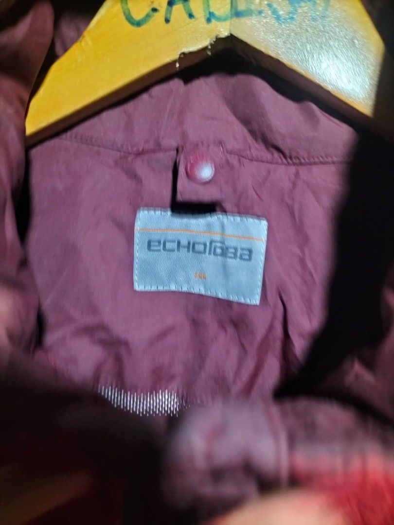 Echorova Red Hooded Outdoor Jacket (Category: Coats, Jackets and Outerwear) located in Valencia. Submitted by cabisaythriftshop (Listing ID 1471225717, Image 3). Description: - Brand: Echorova - Color: Red and maroon - Hood with adjustable drawstrings - Front zip closure with Velcro storm flap - Functional chest pocket with zip detailing - Adjustable Velcro cuffs for a better fit - Authentic brand label stitched inside the collar.