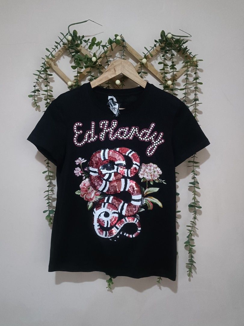 Ed Hardy (Category: Shirts) located in Sual. Submitted by kriztyne_29 (Listing ID 1471268169, Image 1). Description: dimes: 18*24.