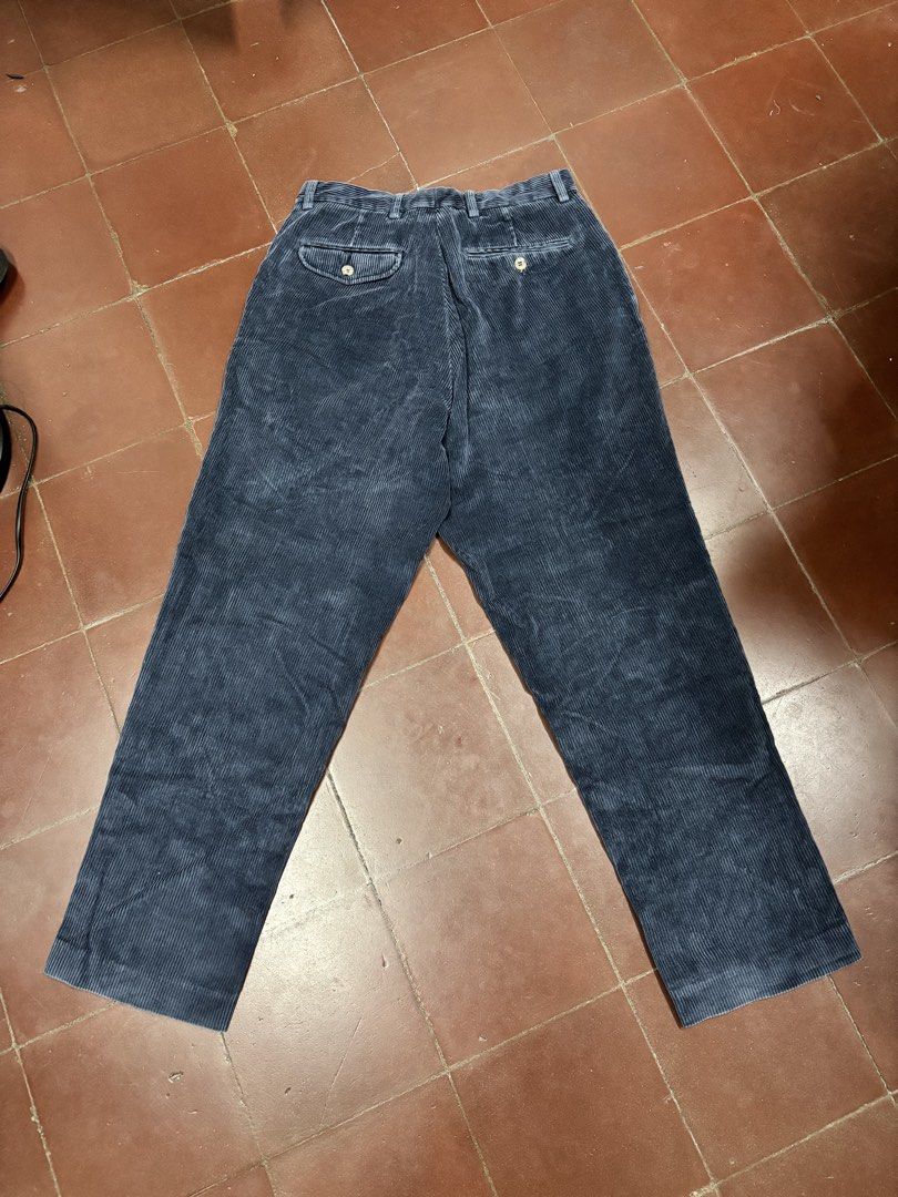Eddie Bauer Blue Corduroy Pleated Pants Size (Category: Trousers) located in Manila. Submitted by mharkie (Listing ID 1471285213, Image 2). Description: - Brand/Model: Eddie Bauer Pleated Corduroy Pants - Color: Dark Blue - Size: 31/30 - Material: 90% Cotton, 10% Polyester - Origin: Made in Mexico - Fit & Texture: Comfortable relaxed fit with wide whale texture - Features: Button-closure back pockets and waist belt loops - slightly discoloration 