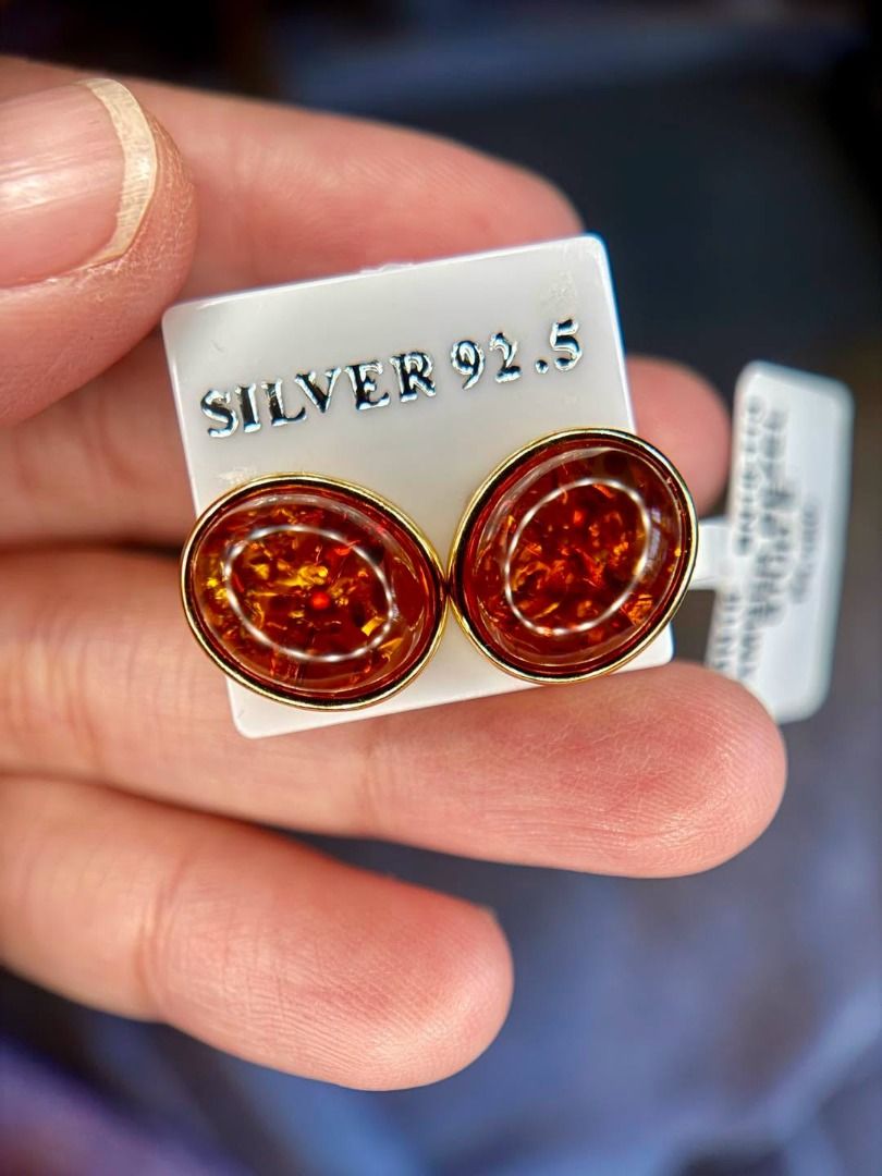 enuine Amber Stud Earrings | Gold-Plated Silver (Category: Earrings) located in Baguio. Submitted by asna_taku (Listing ID 1471165530, Image 1). Description: 🍯 Genuine Amber Stud Earrings | Gold-Plated Silver Love the warm, fiery glow of genuine amber! ✨ Each stone features unique natural inclusions in rich honey-orange tones, making every pair beautifully distinctive. 💛 Genuine Amber ✨ Brand-new silver plated in gold 🌟 Classic bezel-set desig