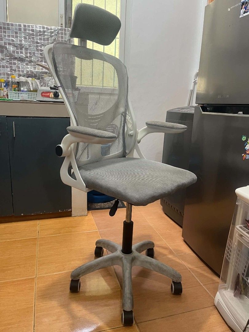 Ergonomic Mesh Office Chair with Headrest Grey (Category: Office Furniture & Fixtures) located in Paranaque City. Submitted by rjaymagdael (Listing ID 1471195342, Image 1). Description: - Color: Clean white frame with breathable grey mesh - Ergonomic Design: All-mesh backrest, seat, armrests, and headrest for maximum airflow - Built-in Support: Integrated lumbar piece to keep your back happy during long hours - Fully Adjustable: Height-adjustable