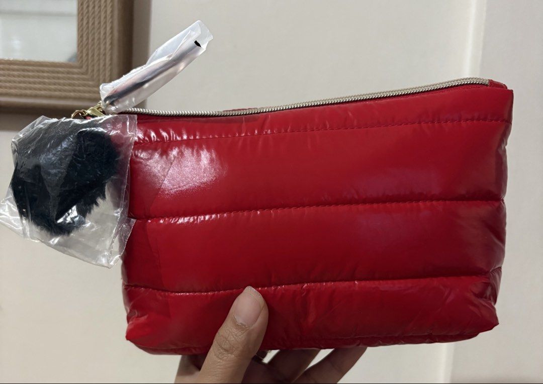 Estee Lauder Red Puffer Cosmetic Pouch (Category: Purses & Pouches) located in Cavite. Submitted by chubbsavenue (Listing ID 1471175277, Image 3). Description: This is a GWP (Gift with Purchase) from the actual store. Guaranteed Authentic!.