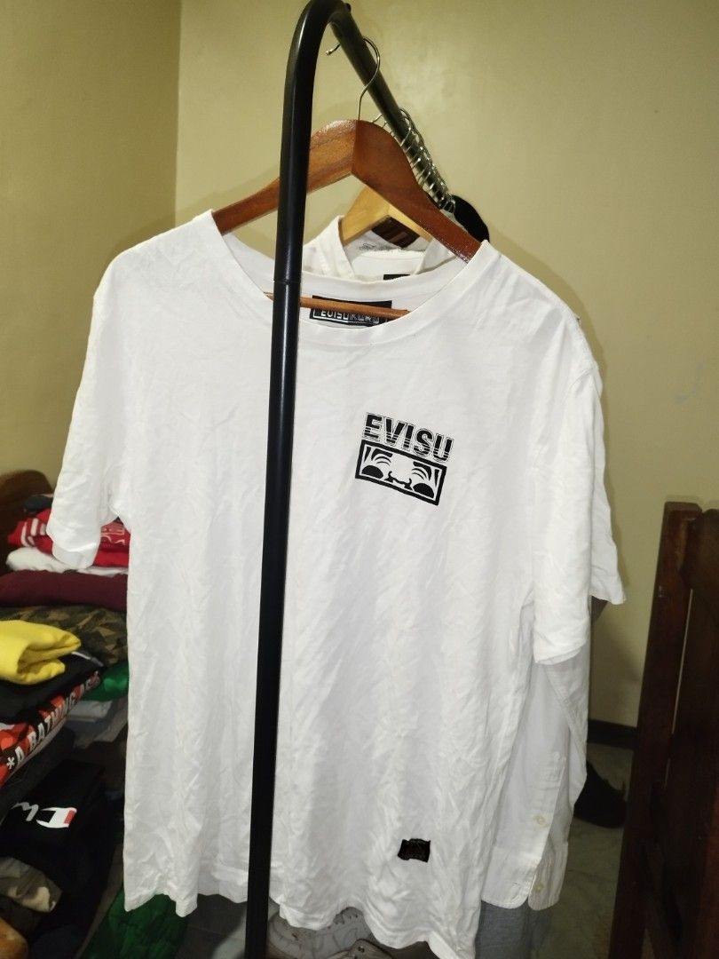 Evisukuro White Graphic T-Shirt (Category: Tshirts & Polo Shirts ) located in Tuguegarao City. Submitted by ZeevLim (Listing ID 1471285357, Image 2). Description: evisu kuru 21w28l large light stain/hairlines/pinholes not visible.