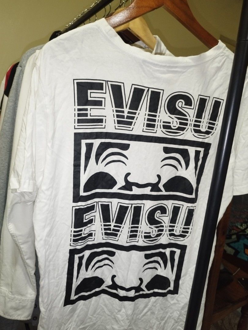 Evisukuro White Graphic T-Shirt (Category: Tshirts & Polo Shirts ) located in Tuguegarao City. Submitted by ZeevLim (Listing ID 1471285357, Image 1). Description: evisu kuru 21w28l large light stain/hairlines/pinholes not visible.