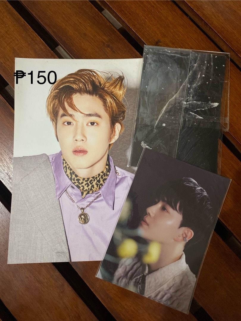 EXO Suho Photo Prints Postcards Set (Category: K-Wave Merchandise) located in Pateros City. Submitted by strawberhyun (Listing ID 1471149789, Image 1). Description: - Official EXO Suho merch clearing out sale - Includes 3 photo prints and 1 large poster (150 PHP each or bundled) - Features glossy finishes and protective plastic sleeves - Perfect for Eris expanding their collection - DM for any questions.