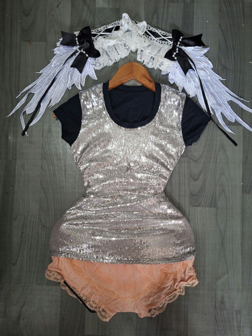Fairy Cosplay Outfit Sequin Top Wings Set (Category: Sets or Coordinates) located in Manila. Submitted by irramay0064845 (Listing ID 1471141249, Image 3). Description: - Complete fairy cosplay set ready to wear - Includes peach and silver sequin tops and layered lace shorts - Comes with angel wings featuring black ribbon bows and pearl strands - Includes matching lace headbands - Versatile pieces with multiple styling options - Ideal for parties,