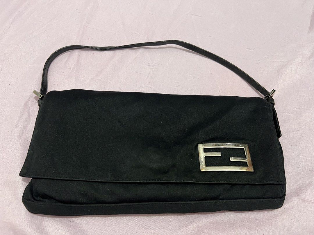 Fendi Black Nylon FFMomento Shoulder Bag (Category: Luxury Bags & Wallets) located in Manila. Submitted by czaaay (Listing ID 1471124668, Image 1). Description: - Brand: Fendi - Material: Durable black nylon with black leather strap - Hardware: Distinctive silver-tone FF metal logo plaque - Design: Slim profile, practical single strap, flap closure - Style: Timeless Y2K aesthetic, versatile for daily outfits - Condition: Clean shape and well-main