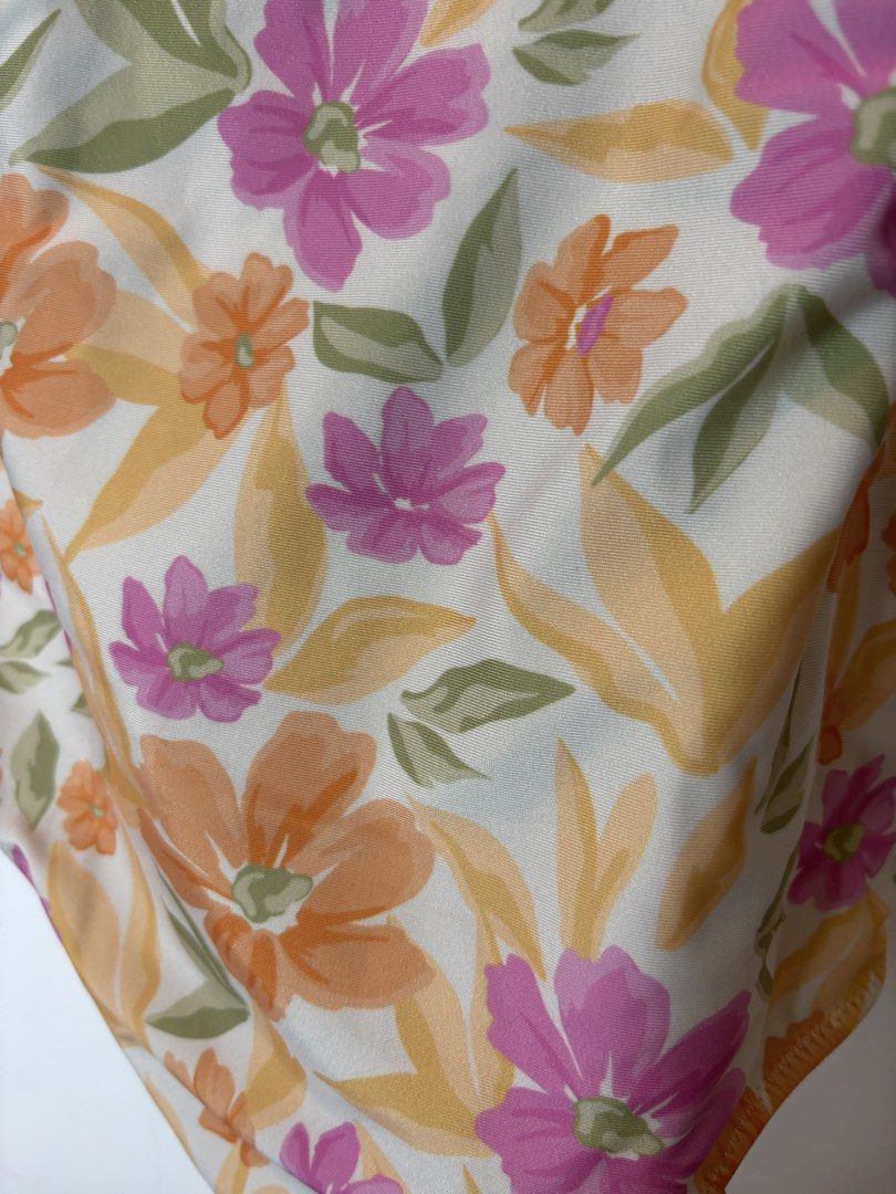 Floral One-Piece Swimsuit (Category: Bikinis & Swimsuits) located in Muntinlupa City. Submitted by danir918 (Listing ID 1471186589, Image 3). Description: - Cream floral one-piece swimsuit with pink, orange, and yellow flowers - Adjustable spaghetti straps with metal sliders for a custom fit - Scoop neckline and low scoop back design - store price: 2,000+ .