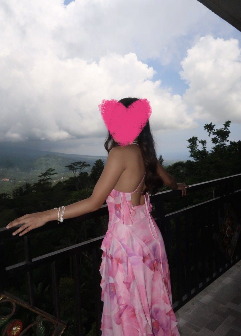 Floral Print Maxi Dress (Category: Dresses) located in Manila. Submitted by flairetaylan (Listing ID 1471256250, Image 2). Description: - Brand: Sheib - Style: Pink floral maxi dress with spaghetti straps, low open back, ruffled hem, and front slit - Material: Lightweight chiffon - Condition: Great, worn once for a photoshoot with no stains or loose threads - Perfect for vacations and special occasions.