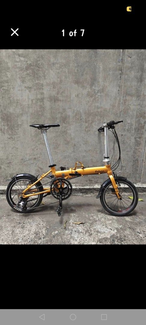 Fnhon Folding Bicycle Yellow (Category: Bicycles) located in Valenzuela. Submitted by luckydragon.859287 (Listing ID 1471129758, Image 3). Description: - Eye-catching bright yellow Fnhon folding bike - Compact and easy-to-fold frame, ideal for small spaces - Practical black fenders installed over both wheels - Upgraded with reliable Litepro components around the brakes - Smooth gear setup, ready to ride - Convenient bottle cage mounted on the mai