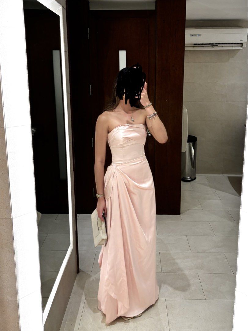 FOR RENT: Pink Silk Gown (Category: Dresses) located in Pasig City. Submitted by col_m (Listing ID 1471135599, Image 1). Description: CUSTOM SILK PINK STRAPLESS GOWN Amazing quality :) Perfect for wedding guests Had this custom made for Php20k - Pink strapless gown - Draped front design - Floor-length hemline - Fitted bodice - Made from smooth, satin-like fabric Size XS Bust 31-32 Waist 25-26 Php 2,000 to rent for 3 days (+200 for each additional