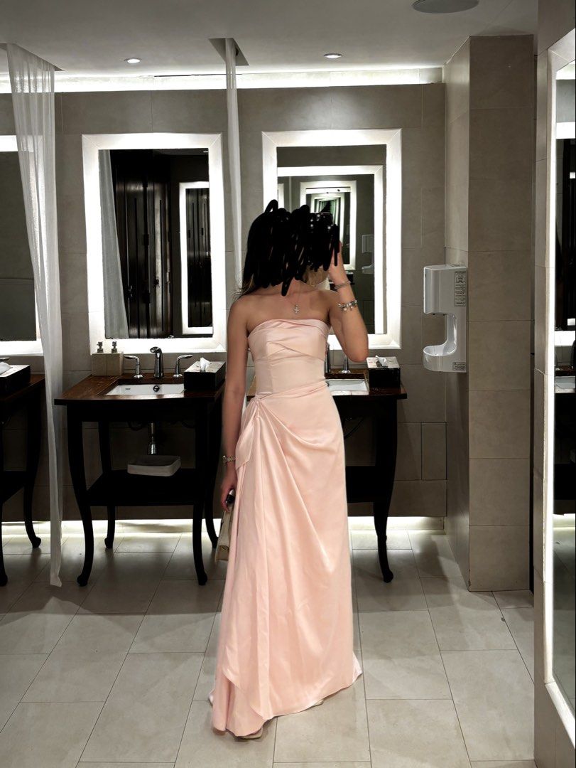 FOR RENT: Pink Silk Gown (Category: Dresses) located in Pasig City. Submitted by col_m (Listing ID 1471135599, Image 2). Description: CUSTOM SILK PINK STRAPLESS GOWN Amazing quality :) Perfect for wedding guests Had this custom made for Php20k - Pink strapless gown - Draped front design - Floor-length hemline - Fitted bodice - Made from smooth, satin-like fabric Size XS Bust 31-32 Waist 25-26 Php 2,000 to rent for 3 days (+200 for each additional