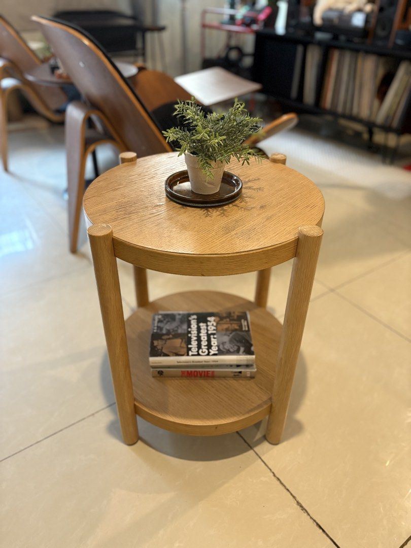 For Sale: IKEA LISTERBY Side Table 🪵✨ (Category: Tables & Sets) located in Quezon City. Submitted by se2ndlookph (Listing ID 1471121755, Image 2). Description: For Sale: IKEA LISTERBY Side Table 🪵✨ Selling a minimalist round accent table in light oak veneer. Features an extra lower shelf for easy storage. Perfect beside your sofa or bed! • Condition: Pre-loved (has some water rings/marks on the top surface and minor edge scuffs near the leg joi