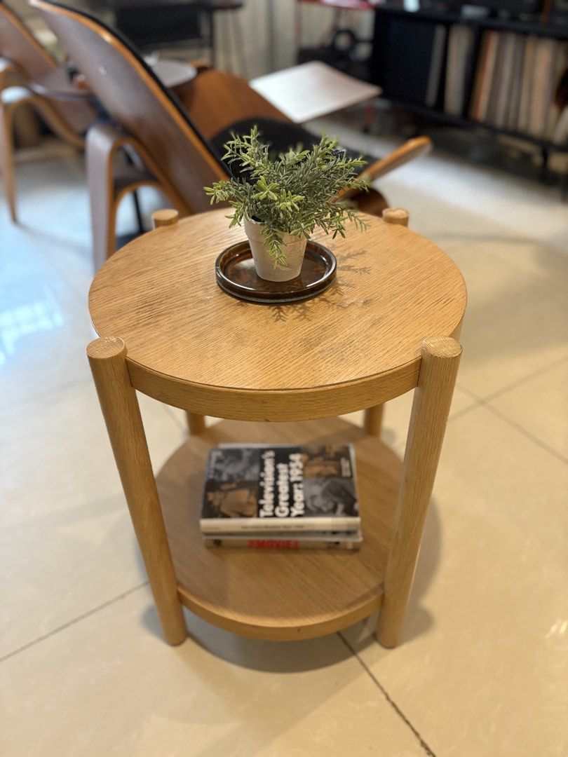 For Sale: IKEA LISTERBY Side Table 🪵✨ (Category: Tables & Sets) located in Quezon City. Submitted by se2ndlookph (Listing ID 1471121755, Image 3). Description: For Sale: IKEA LISTERBY Side Table 🪵✨ Selling a minimalist round accent table in light oak veneer. Features an extra lower shelf for easy storage. Perfect beside your sofa or bed! • Condition: Pre-loved (has some water rings/marks on the top surface and minor edge scuffs near the leg joi