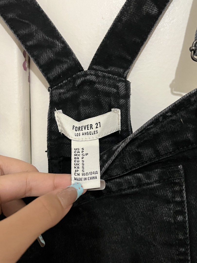 Forever 21 black denim overall dress (Category: Dresses) located in Pasig City. Submitted by kirstenswardrobe (Listing ID 1471242437, Image 2). Description: - Size S - in good condition - MOP: Gcash 💌 Message for Inquiries!.