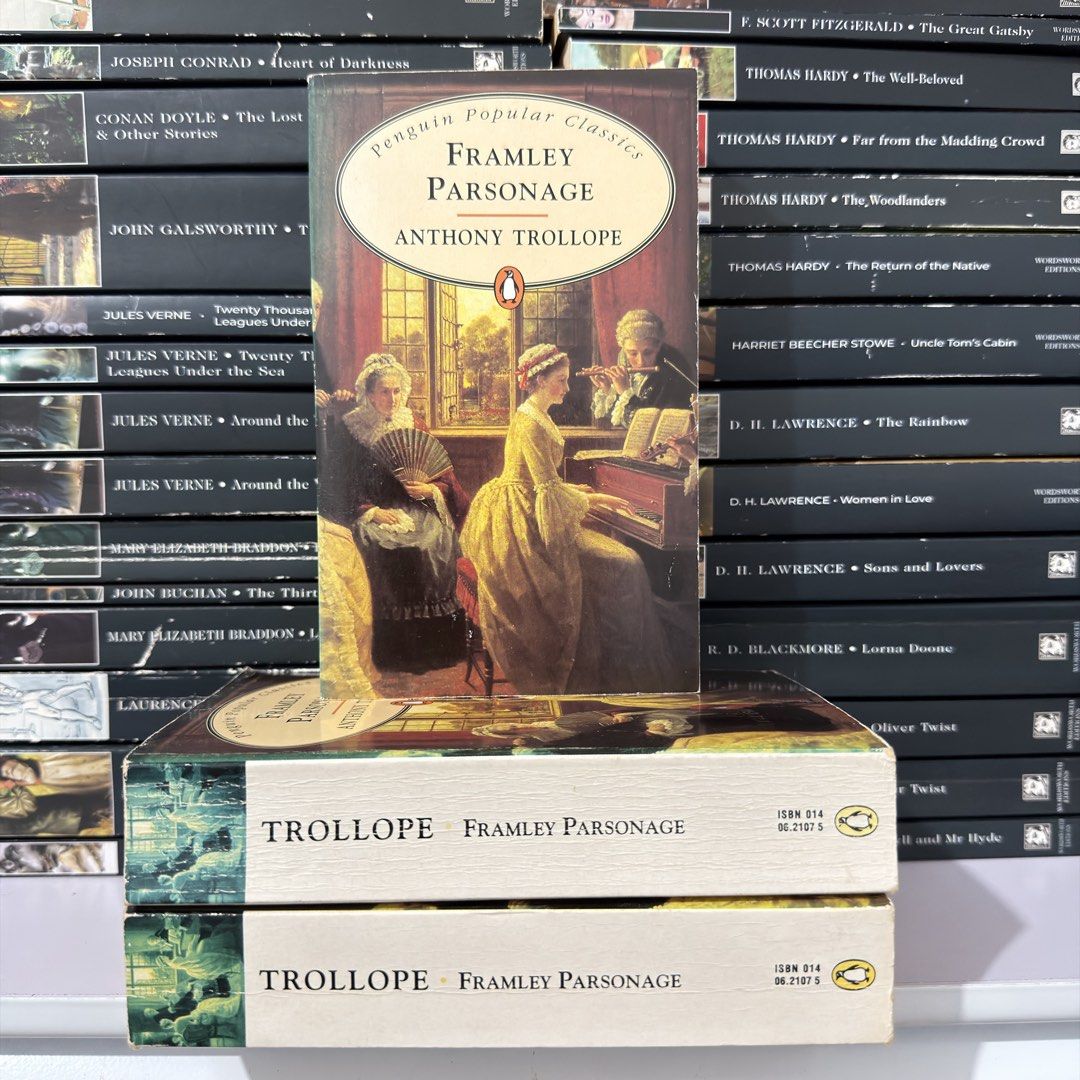 Framley Parsonage by Anthony Trollope Penguin Popular Classics (Category: Storybooks) located in Lingayen. Submitted by readwjane (Listing ID 1471135905, Image 1). Description: - Title: Framley Parsonage - Author: Anthony Trollope - Edition: Penguin Popular Classics (Paperback) - ISBN: 0140621075 - Condition: Clean spine, readable pages - Cover Art: Classic 18th-century interior scene featuring piano and sewing.