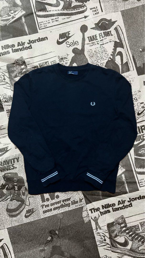 Fred Perry Black Crewneck Sweatshirt Size L (Category: Coats, Jackets and Outerwear) located in Manila. Submitted by jlfamiliar69452 (Listing ID 1471146749, Image 1). Description: - Brand: Fred Perry - Item: Crewneck Sweatshirt - Color: Black with white embroidered laurel wreath logo - Size: L (Tag on collar) - Details: Striped ribbed cuffs and hem, classic pullover style - Origin: Made in China - Style Code: M2599.