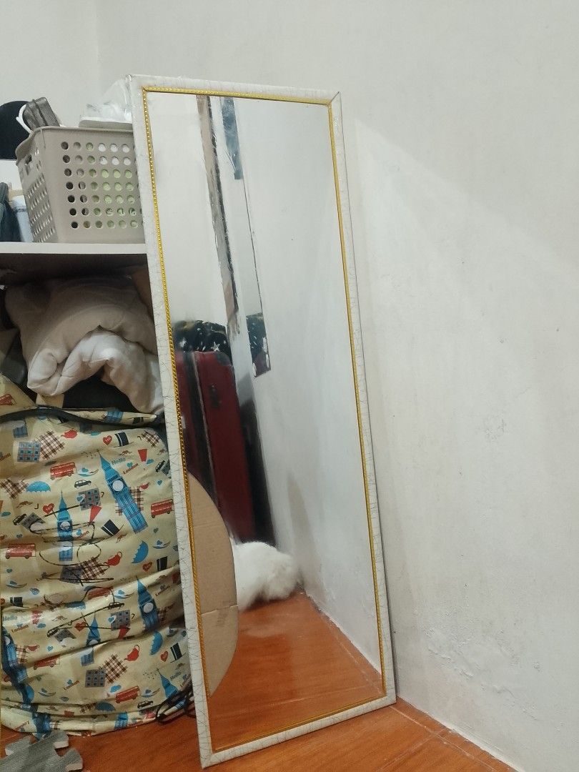 Full length standing mirror with gold trim (Category: Mirrors) located in Manila. Submitted by goldenearth.883664 (Listing ID 1471295236, Image 2). Description: - Type: Rectangular floor mirror (lean-to style) - Color/Design: White frame with elegant thin gold beaded inner detailing - Condition: Clean, flawless glass surface - Placement: Stable and easy to position against any wall on wooden or tiled floors - Perfect for: Bedroom OOTD checks, roo