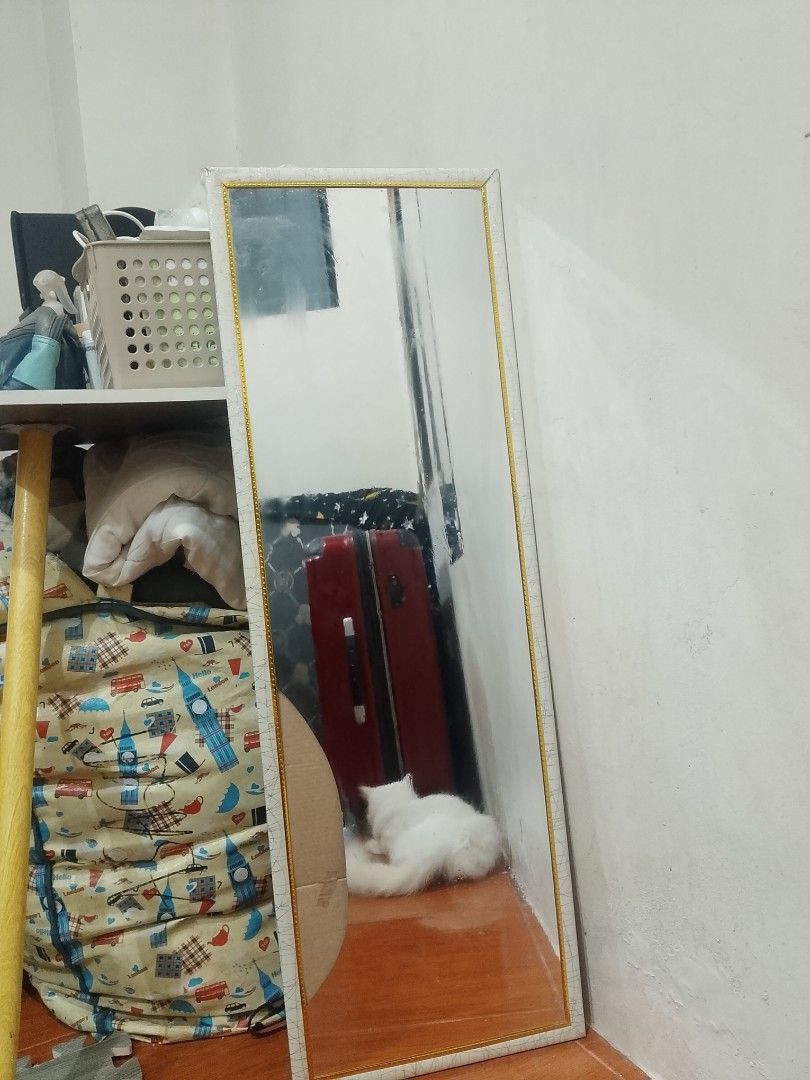 Full length standing mirror with gold trim (Category: Mirrors) located in Manila. Submitted by goldenearth.883664 (Listing ID 1471295236, Image 1). Description: - Type: Rectangular floor mirror (lean-to style) - Color/Design: White frame with elegant thin gold beaded inner detailing - Condition: Clean, flawless glass surface - Placement: Stable and easy to position against any wall on wooden or tiled floors - Perfect for: Bedroom OOTD checks, roo