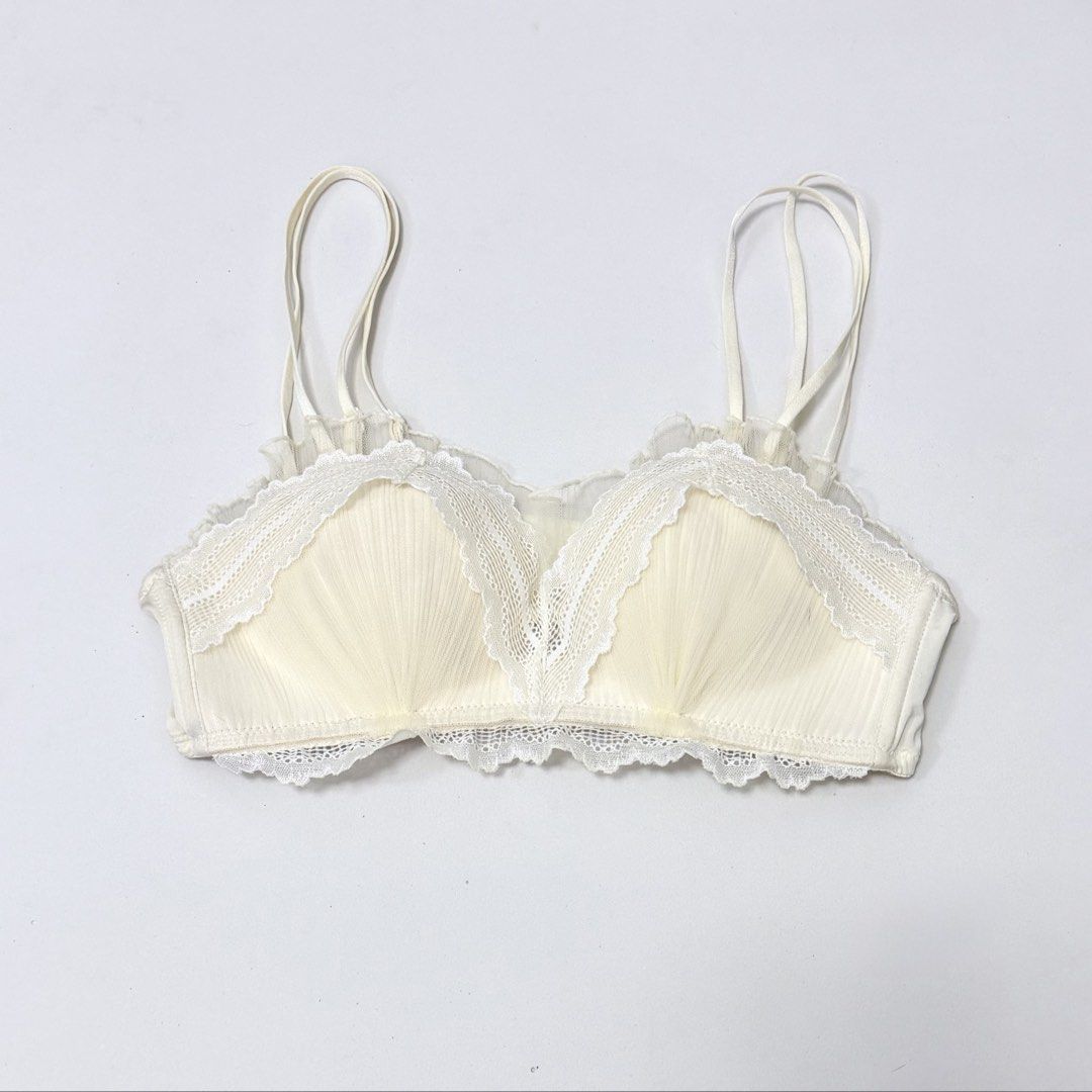 GAINREEL Seashell Pleated Lace Push-up Bra [34AB] (Category: Undergarments & Loungewear) located in Malabon City. Submitted by k_intimates (Listing ID 1471200992, Image 1). Description: Details: • Size 34AB / wireless / push-up • Like new • Gainreel Seashell Pleated Lace Bra in ivory white features a delicate seashell-inspired fan design with soft scallop-lace trim along the neckline and bottom band..