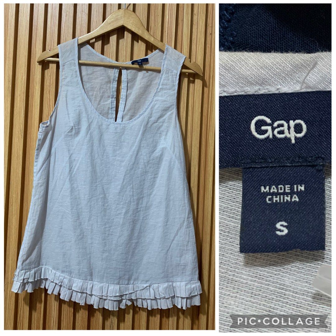 Gap Light Blue Sleeveless Ruffle Hem Tank Top (Category: Sleeveless) located in Koronadal. Submitted by girlish1105 (Listing ID 1471283083, Image 1). Description: - Brand: Gap - Size: Small - Color: Light blue - Neckline: Round neck with keyhole opening and back button closure - Details: Cute ruffled hem at the bottom - Fabric: Lightweight and breathable, ideal for warm weather - Condition: Clean, well-kept, and ready to wear.